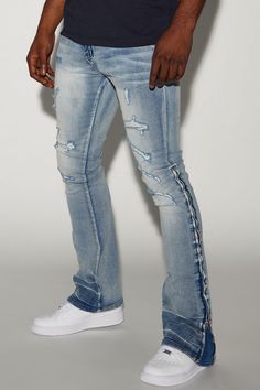 Available In Medium Wash. Stacked Skinny Flare Fit Stretch Denim 70% Cotton 28% Polyester 2% Spandex Disclaimer: Due To The Distressing Process, & Wash Process, Each Garment Is Unique. Zip Fly Button Closure 5 Pocket Detail Ankle Zipper Drop Imported | Mens Stand Out Stacked Skinny Flare Jeans in Medium Wash size 36 by Fashion Nova Fitted Medium Wash Jeans With Zip Fly, Fitted Jeans For Streetwear With Zipper, Fitted Jeans With Zipper Closure For Spring, Stretch Jeans With Zip Fly For Streetwear, Fitted Cotton Jeans With Zipper Closure, Fitted Denim Jeans With Zipper Closure, Fitted Jeans With Button Zip Fly For Streetwear, Fitted Jeans With Zipper Closure For Streetwear, Luxury Distressed Flare Jeans For Streetwear