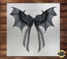 a drawing of a bat hanging on a wall