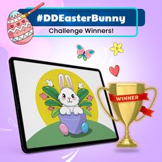 a tablet with an image of a bunny on it and a trophy next to it