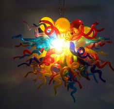 a multicolored light hanging from a chain