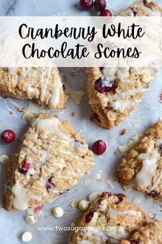 cranberry white chocolate scones with icing and cherries on the side