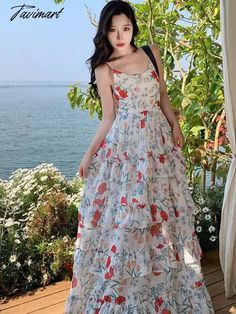 Tavimart Summer Backless Beach Ruffles Cake Long Dress Women Sleeveless Print Floral Retro Dress Korean Style Evening Party Slip Dresses Measurement In CM Size Chest Waist Length S 80 60 128 M 84 64 129 L 88 68 130 XL 92 72 131 Measurement In Inch Size Chest Waist Length S 31.5 23.6 50.4 M 33.1 25.2 50.8 L 34.6 26.8 51.2 XL 36.2 28.3 51.6 Sleeveless Ruffle Dress For Beach Season, Tiered Sleeveless Ruffle Dress For Vacation, Tiered Sleeveless Sundress For The Beach, Multicolor Sleeveless Ruffled Dress For Vacation, Vacation Tiered Sleeveless Dress With Ruffles, Red Ruffled Sleeveless Beach Dress, Red Sleeveless Beach Dress With Ruffles, Multicolor Sleeveless Dress With Ruffles, Multicolor Ruffled Sleeveless Dress For The Beach