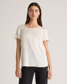 We love to luxe up an everyday look. This classic tee is made from washable silk, with a bit of stretch for the perfect fit. The crew neck and tulip hem gives it a little curvature for a more premium look. The washable silk makes this top super easy to care for. Plus, silk fiber contains 18 kinds of amino acids that make it amazing for skin nourishment, hypo-allergenic, and naturally thermoregulating to help maintain body temperature.  | Quince | Women's 100% Washable Silk Stretch T-Shirt in Ivo Silk Fiber, Silk Tee, Boyfriend Cardigan, Natural Textiles, Fabric Structure, Body Temperature, Mulberry Silk, Natural Fabrics, Quince