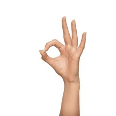 a person's hand making the v sign with their fingers against a white background