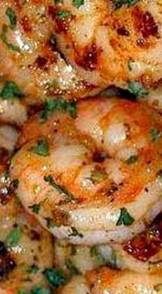 close up view of cooked shrimp with herbs