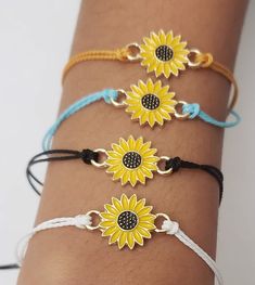 This cute bracelet with a bright sunflower charm can double as an anklet. Made with cotton thread and an adorable sunflower charm with an easy slide knot. 100 % of the profit from the sale of this item will be donated to UNICEF. Adjustable Flower Friendship Bracelets For Summer, Cute Adjustable Yellow Friendship Bracelets, Flower Shaped Friendship Bracelets As Summer Gifts, Summer Flower Friendship Bracelets, Summer Flower Friendship Bracelets As Gift, Yellow Friendship Bracelets As Summer Gifts, Flower Friendship Bracelets For Beach, Cute Adjustable Friendship Bracelets For Summer, Yellow Adjustable Friendship Bracelets As Gift