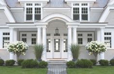 a large white house with columns and windows