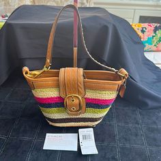 Original Owner Never Used! Too Cute! Multi Color Straw With Natural Leather Trim, Hangtag And Strap. Unique Only One On Poshmark!! Coach Bags For Summer Travel, Coach Summer Shoulder Bag For Everyday, Coach Bags For Travel In Summer, Coach Bags For Daily Use In Summer, Coach Travel Bags For Summer, Summer Coach Shoulder Bag For Everyday Use, Summer Travel Coach Bags, Multicolor Coach Bags With Gold-tone Hardware, Coach Multicolor Bags With Gold-tone Hardware