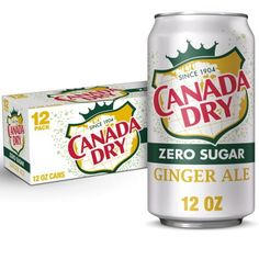 a can of canada dry beer next to a box of ginger ale 12ozs