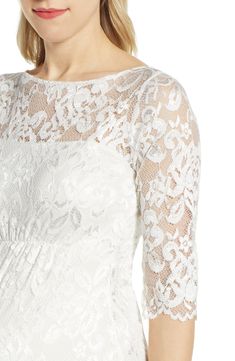 With a bit of shimmer and cut in a vintage style, this bump-flattering sheath of floral lace is simply perfect for weddings and other special events. Slips on over head Bateau neck Three-quarter sleeves Get the perfect fit—book an appointment with one of our alterations experts Lined 94% nylon, 6% spandex Dry clean Made in the UK Fitted Lace For Mother Of The Bride, Elegant Lace Top Dress For Wedding Night, Mother Of The Bride Fitted Lace Dress, Elegant Fitted Lace Dress For Wedding Night, Elegant Fitted Lace For Wedding Night, Tiffany Rose, Bateau Neck, Nordstrom Dresses, Three Quarter Sleeves