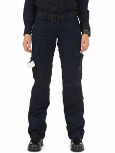 The 5.11 Tactical Women's EMS Cargo Pant was designed with direct feedback from EMS professionals around the world. This pant is crafted from a 7.3 oz. poly/cotton twill fabric. The cargo pockets have internal dividers to sort all your medical gear and secondary cargo pockets at the calf for convenient storage while kneeling. The double time belt loops provide enhanced anchoring for accessories and a rear web strap allows you to customize your loadout quickly and easily. The double reinforced seat and knees offer enhanced resilience while integrated knee pad pockets offer superior protection and comfort when working on hard surfaces.Inseam:Regular - 31" InseamLong - 35" InseamFeatures:Prym snapsYKK zippersCalf cargo pocketsGusseted constructionDouble-time belt loopsSelf-adjusting tunnel wa 5.11 Tactical, Tactical Clothing, Tactical Pants, Hunting Clothes, Lower Leg, Knee Pads, Cargo Pant, Dark Navy Blue, Twill Fabric