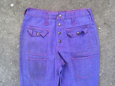 Hello and thanks for taking a gander at my item! Up for your consideration today is a lovely 1960s 1970s Maverick Snap Button Up Flare Big Bell Bottom Purple Denim Jeans. Denim is beautiful and perfectly worn with great distress and a lovely overall look! Ideal for designers and purveyors of good style! Jeans do have a hole on the back of the left leg, as well as some wear from where the jeans were once hemmed. Pants are size 29 x 29, but please see below for measurements. Thanks for looking, an Purple Denim, 70s Denim, Star Jeans, Style Jeans, Bell Bottom, Vintage 1970s, Jeans Denim, Bell Bottoms, Snap Button