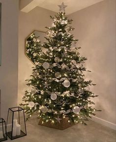 a decorated christmas tree in a living room