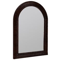 a large mirror sitting on top of a wooden frame