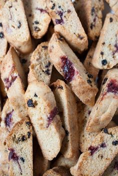 blueberry biscuits are piled up in a pile and ready to be eaten