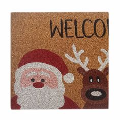 a welcome mat with santa and reindeer on it