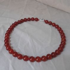 PREFERENTIAL POLICIES : The order is $20 or more.There will be a 10% discount.long-term effective. Please use the coupon code: CZH10 Welcome back to my shop: https://www.etsy.com/shop/pearlandjewelry Description of the product in the picture: The necklace lengh is 17 inches ,I make the necklace to use 10mm pure natural red agate, The pearls are individually hand knotted . IT is good necklace for your great wedding, Pearl Jewelry: necklace Pearl Type: agate color: red size: 10 mm length: 17 inch Elegant Agate Round Crystal Necklaces, Elegant Round Agate Crystal Necklaces, Elegant Round Agate Crystal Necklace, Carnelian Single Strand Jewelry For Gifts, Elegant Carnelian Beaded Necklace As A Gift, Elegant Carnelian Beaded Necklace For Gifts, Elegant Carnelian Crystal Necklace For Gift, Elegant Carnelian Crystal Necklace Gift, Round Agate Beaded Necklaces For Gifts