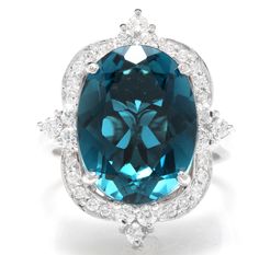 12.75 Carats Natural Impressive LONDON BLUE TOPAZ and Diamond 14K White Gold Ring Suggested Replacement Value $6,200.00 Total Natural London Blue Topaz Weight: Approx. 12.00 Carats London Blue Topaz Measures: Approx. 15 x 11mm Natural Round Diamonds Weight: .75 Carats (color G-H / Clarity SI1-SI2) Ring total weight: 9.0 grams Disclaimer: all weights, measurements and colors are approximate and may vary slightly from the listed dimensions or as seen in the image. All pictures are magnified to sho Emerald Cut Rings, London Blue Topaz Ring, Gold Cocktail Ring, Etsy Gold Ring, Rings Diamond, Diamond Cocktail Rings, Pink Topaz, Star Jewelry, 14k White Gold Ring