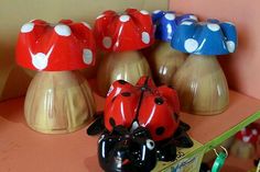 several colorful ceramic vases sitting on top of a table