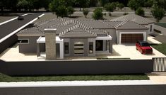 an aerial view of a house with a car parked in the front yard and driveway