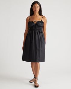 Discover the effortless charm of our 100% Organic Cotton Keyhole Midi Dress. Crafted with care from premium organic cotton poplin, this must-have dress has a cool, crisp look and a lightweight feel. The smocked bodice hugs your ribs in a flattering yet comfortable way, while the front tie and adjustable straps allow you to customize the fit. Best part: it has pockets! Easy to dress up or down, this chic silhouette works for a range of occasions. Cotton Ruched Midi Dress For Day Out, Casual Cotton Ruched Midi Dress, Cotton Ruched Sundress Midi Dress, Cotton Ruched Midi Sundress, Black Cotton Midi Dress For Day Out, Cotton Ruched Midi Dress For Brunch, Chic Cotton Midi Dress With Relaxed Fit, Black Cotton Dress For Brunch, Casual Black Cotton Dress For Brunch