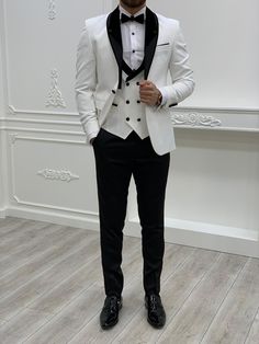 Size :46-48-50-52-54-56Suit material: 65% polyester 35% viscoseMachine Washable : No jacket slit : double slitproduct content : Jacket +Vest +Pants+bow tie Remarks: Dry Cleaning Only Delivered Time : 2-4 bussines day Best Wedding Suits For Men, Shawl Lapel Tuxedo, Austin White, Best Wedding Suits, White Wedding Suit, Classy Suits, Pants Gift, Slim Fit Tuxedo, White Tuxedo