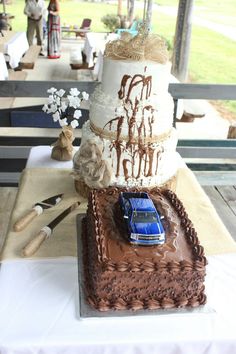 a three tiered cake sitting on top of a table