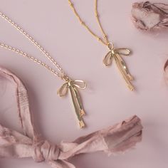 Make a statement with this trendy Bow Necklace. Ribbons have been all the rave this season, and we found the perfect way to get on this trend. …………………………………. Details: Pendant Is Gold Filled or Silver Plated measuring approx. 33.4mm x 19mm x 2.4mm Chain is 14K Gold Filled or Sterling Silver Size Inclusive and can be made in any size needed Waterproof and can be worn all the time Adjustable Ribbon Necklaces For Party, Party Charm Necklaces, Dainty Party Jewelry With Ribbon, Trendy Christmas Party Jewelry, Valentine's Day Party Charm Necklace With Clavicle Chain, Valentine's Day Party Clavicle Chain Charm Necklace, Adjustable Gold Charm Necklaces For Party, Adjustable Gold Charm Necklace For Party, Trendy Charm Necklaces With Adjustable Chain For Party