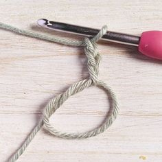 the crochet hook is hooked up and ready to be made into a bracelet