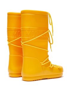 Find MOON BOOT Icon Rain Boots on Editorialist. mustard yellow round toe front lace-up fastening slip-on style embossed logo to the side flat rubber sole knee-length Boots Moon, Yellow Rain Boots, Felt Boots, Quilted Boots, Yellow Boots, Mule Sneakers, Canvas Boots, Warm Spring