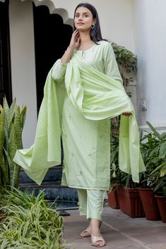 This is 3 piece set.It comes with mirror embellished kurta teamed with trouser and a dupatta to match. 3 Piece Set Fabric-Cotton Color-Green Work-Mirror embellished, embroidered & lace detailing with front & side tassels Kurta Detailing-Calf length kurta with side slits Bottom-Flared Sharara Sleeves-3/4th Sleeves Neck-Round Neck Occasion-Festive wear Washing care-Hand wash Embellished Suit, Green Mirror, Green Mirrors, Match 3, Suit Set, Embroidered Lace, Festival Wear, Indian Wear, Lace Detail