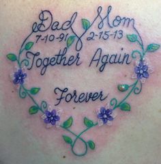 the back of a woman's shoulder with flowers and leaves on it that says, dad