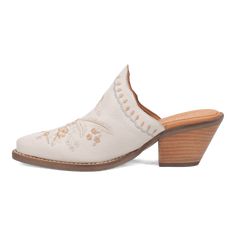 Stand out in room full of wallflowers with the Dingo1969 Wildflower leather mule. The floral embroidery and dainty feel is perfect for work, a night out, and is offered in several color ways. White Leather Mules For Spring, Western Style Mules For Spring, Feminine Leather Mules For Spring, Feminine Leather Mules, Cream Leather Mules For Spring, Chic White Mules For Fall, White Medium Width Leather Mules, Spring Rodeo Leather Mid-calf Boots, White Western Style Mid-calf Boots For Summer