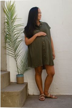 "Breezy button front tunic dress that can be worn many ways. Comfortable and flattering before, during, and after pregnancy. Breastfeeding friendly. Oversized style that is great stand alone piece, or can be worn with leggings, shorts, or as a swimsuit coverup.  DETAILS Sustainably made from deadstock fabric  Olive color - 100% Cotton Gauze Straw color - Cotton/Rayon blend tonal stripe fabric Natural buttons  Made in Downtown Los Angeles FIT One Size Bust - 58\" Hip is 78\" Length 34\" Model is 5'6\" and in her third trimester.*Free Shawl Gift with Purchase* - see description under my listings \"Open Weave Ruana\"" Summer Daywear Nursing-friendly Maternity Dress, Summer Maternity Dress Nursing Friendly Daywear, Summer Maternity Dress, Nursing Friendly, For Daywear, Summer Tunic With Button Closure, Casual Tunic With Button Closure For Daywear, Casual Relaxed Fit Button-up Tunic, Relaxed Fit Button-up Tunic, Casual Rayon Shirt Dress For Daywear, Casual Short Sleeve Rayon Shirt Dress