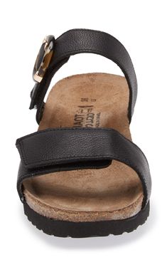 A rounded buckle stands out at the strap of a summery sandal set on a walkable wedge for everyday comfort and style. 1 1/4" heel (size 39) Adjustable hook-and-loop straps Cushioned footbed with arch support Leather upper and lining/synthetic sole Imported Leather Open Toe Footbed Sandals, Modern Wedge Sandals With Buckle Closure, Modern Wedge Sandals With Buckle Closure And Round Toe, Everyday Sandals With Leather Footbed, Adjustable Round Toe Sandals For Everyday Use, Wedge Heel Sandals With Buckle Closure, Everyday Slingback Sandals With Leather Footbed And Round Toe, Adjustable Slingback Sandals With Round Toe, Black Sandals With Adjustable Strap For Everyday