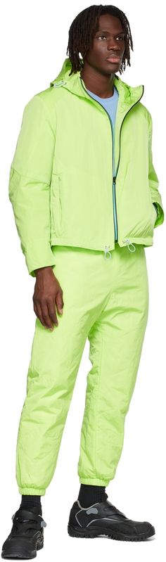 Long sleeve nylon taffeta jacket in green. · Zip closure with trim in blue · Bungee-style drawstring in blue at hood and hem · Concealed zip pockets at waist · Inset elasticized cuffs · Storm flap and patch pocket at back Avaible exclusively at SSENSE. Supplier color: Lime Taffeta Jacket, Lounge Pants, Patch Pocket, Zip Pockets, Lounge, Women Wear, Relaxed Fit, Trim, Long Sleeve