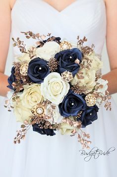 a bridal bouquet with blue and white flowers