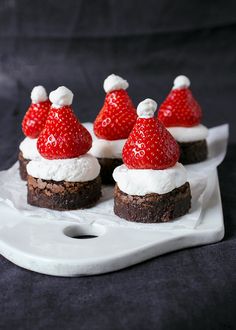 small chocolate desserts with strawberries on top