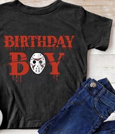 Adult Birthday Boy Jason Voorhees inspired Friday Graphic Tee Graphic Unisex T-Shirt Perfect birthday shirt for the Friday the 13th horror fan! Available In Red Font on Black T-shirt. Note that shirts do not come with rolled sleeves or knots, and that shirts are unisex and can be worn in a feminine or masculine. Please consult the size chart in the pictures above and below to find what size you'll need before purchasing. XS S M L XL 2XL 3XL 4XL Sleeve Length 8 8.25 8 5/8 9 1/8 9 5/8 10.25 N/A N/ Jason Birthday Party, Black Band Merch T-shirt For Birthday, Casual Halloween Birthday T-shirt, Black T-shirt For Halloween Birthday, Casual T-shirt For Halloween Birthday, Birthday Band Merch Tops With Short Sleeves, Short Sleeve Band Merch Tops For Birthday, Band Merch Tops For Birthday With Short Sleeves, Friday The 13th Birthday Party