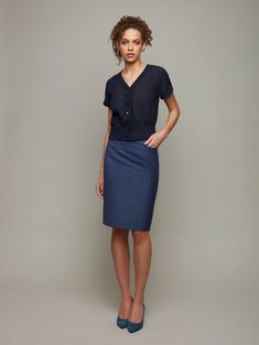 A fabulously fitting knee-length pencil skirt will become one of the most versatile hardest working pieces in your professional wardrobe.Satin side panels make it stand out for all the right reasons. It's fully lined to move gracefully with you and is exceptionally finished - a piece that's made to last.It's tricky to give styling advice for a skirt that goes everywhere and does almost everything. We'd suggest a classic shirt/tights/heels combination for work and a sleeveless top and bare legs for evening.Our Column skirt is cut from pure merino wool that drapes beautifully and moves with you. Satin side panels make it stand apart from the rest. It's fully lined and exceptionally finished. Shell100% WoolLining53% Rayon, 47% AcetateCareDry Clean Tights And Heels, Column Skirt, Knee Length Skirt Pencil, Professional Wardrobe, Gray Skirt, Work Blouse, Side Panels, Drop Waist, Skirts For Sale