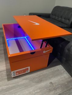 an orange table with a blue light underneath it