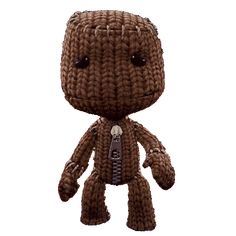 a brown knitted toy with black eyes