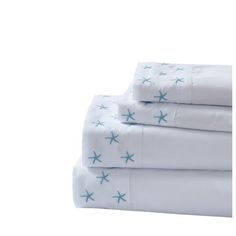 four white sheets with blue stars on them