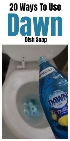 a bottle of dawn dish soap sitting on top of a toilet