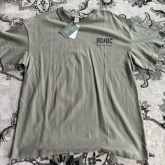 Nwt Never Worn! Khaki Green Color H&m Relaxed Fit T-shirt For Streetwear, H&m Crew Neck T-shirt With Letter Print, H&m Relaxed Fit Graphic Print T-shirt, H&m Relaxed Fit Letter Print T-shirt, H&m Cotton Streetwear T-shirt, H&m Letter Print T-shirt For Summer, H&m Cotton T-shirt For Streetwear, H&m Graphic Tee Tops For Spring, H&m Relaxed Fit Graphic Print Top