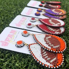 Show your love for the game when accessorizing your Game Day look with these dual colored uniquely beaded football earrings!   The perfect accessory to coordinate with your Friday Night Lights ensemble or Saturday tailgate style. Football Earrings, Glam Jewelry, Nickel Free Jewelry, Sports Jewelry, Earring Collection, Ball Earrings, Friday Night Lights, Earrings Collection, Night Lights