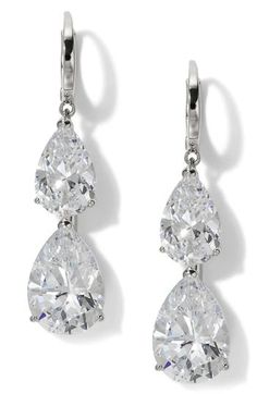 A pair of pear-shaped cubic zirconia creates an elegant aesthetic for these hand-polished earrings set in gleaming 18-karat gold plate. 1 5/8" drop; 3/8" width 18k-gold plate/cubic zirconia Imported White Gold Diamond-cut Teardrop Earrings, White Gold Diamond Cut Teardrop Earrings, White Gold Pear-shaped Teardrop Earrings With Cubic Zirconia, Pear-shaped Cubic Zirconia Bridal Earrings, Diamond White Pear-shaped Teardrop Earrings, Brilliant Cut Teardrop Earrings For Party, Classic Teardrop Earrings In Brilliant Cut Cubic Zirconia, Classic Teardrop Earrings With Brilliant Cut Cubic Zirconia, Diamond White Cubic Zirconia Teardrop Earrings