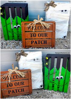 three wooden crates decorated to look like halloween decorations