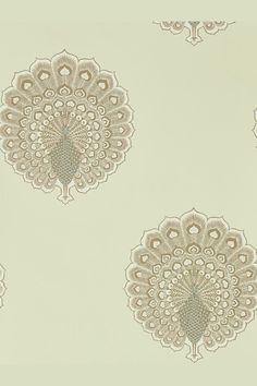 an intricately designed wallpaper pattern in beige and white colors with circular designs on it