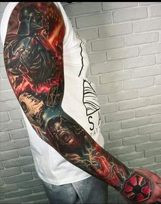 a man with a star wars sleeve tattoo on his left arm and right arm is shown